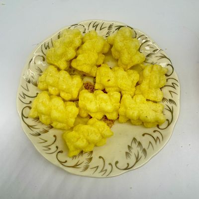 Corny Crunch Extruded Puffs: Sabor autêntico de milho, textura crocante e prazer versátil